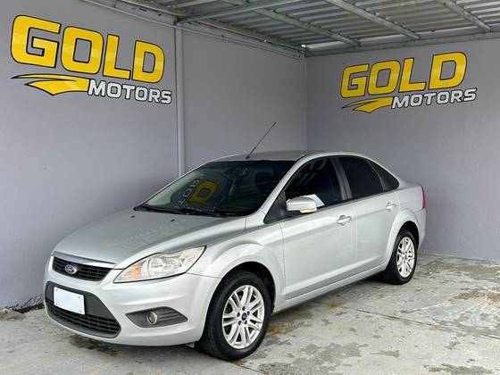 FORD FOCUS 2.0 GHIA SEDAN 16V FLEX 4P MANUAL